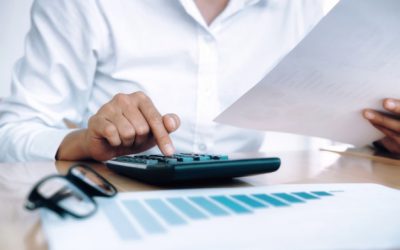 finances-saving-economy-concept-female-accountant-or-banker-use-calculator_1421-92